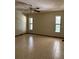 Bright living room with tile flooring and plenty of natural light at 6616 Blanche Ct, Orlando, FL 32818