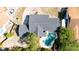 Aerial view of a single-Gathering house featuring a pool, fenced yard, and mature trees at 765 Coach Light Dr, Casselberry, FL 32730