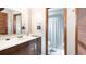 Traditional bathroom featuring a wooden vanity with a marble countertop and a shower at 765 Coach Light Dr, Casselberry, FL 32730