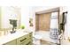 Stylish bathroom with a tiled shower, modern vanity, and elegant fixtures, providing a luxurious and functional space at 765 Coach Light Dr, Casselberry, FL 32730
