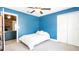 Inviting bedroom features a carpet floor, and a ceiling fan, complemented by closet space for ample storage, with natural light at 765 Coach Light Dr, Casselberry, FL 32730