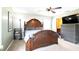 Bedroom showcasing an elegant, carved wood bed frame and a ceiling fan at 765 Coach Light Dr, Casselberry, FL 32730
