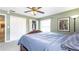Bedroom featuring double closets, a window, and a ceiling fan at 765 Coach Light Dr, Casselberry, FL 32730