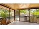 Screened porch overlooking the pool and backyard at 765 Coach Light Dr, Casselberry, FL 32730