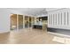 Open concept floor plan with a modern kitchen with an island and sliding doors leading to the outdoors at 7706 Ficquette Rd, Windermere, FL 34786