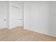 Room with hardwood floors and closets at 7706 Ficquette Rd, Windermere, FL 34786