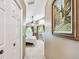 Bedroom entrance showcases a bed with matching curtains and a ceiling fan at 848 Magnolia Creek Cir, Orlando, FL 32828