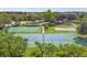 A lively community park boasts a tennis court, basketball court, playground and covered picnic area at 848 Magnolia Creek Cir, Orlando, FL 32828