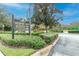 Waterford Chase Recreation Park sign surrounded by beautifully landscaped greenery and trees at 848 Magnolia Creek Cir, Orlando, FL 32828