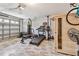 Spacious garage converted into a home gym, equipped with workout equipment at 848 Magnolia Creek Cir, Orlando, FL 32828