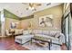 Open concept living and dining room with hardwood floors, neutral paint, and lots of natural light at 848 Magnolia Creek Cir, Orlando, FL 32828
