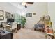 Bright office space with natural light, built-in bookshelves, and a comfortable work area at 848 Magnolia Creek Cir, Orlando, FL 32828