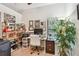 Spacious office features a bright window, stylish decor, and practical storage at 848 Magnolia Creek Cir, Orlando, FL 32828