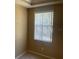 Bright bedroom with carpet, and a single window at 8608 Falstaff Pl, Oviedo, FL 32765