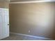 Neutral bedroom with white door and plush carpeting at 8608 Falstaff Pl, Oviedo, FL 32765
