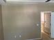 Bedroom with neutral walls, carpet, and ensuite at 8608 Falstaff Pl, Oviedo, FL 32765