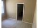 Bright bedroom with plush carpeting and an en-suite bathroom at 8608 Falstaff Pl, Oviedo, FL 32765