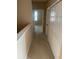 Hallway with neutral walls at 8608 Falstaff Pl, Oviedo, FL 32765