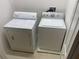 Laundry room featuring side by side washer and dryer at 8608 Falstaff Pl, Oviedo, FL 32765