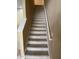 Staircase with carpet at 8608 Falstaff Pl, Oviedo, FL 32765