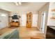 Living room with hardwood flooring and a view of the kitchen at 920 Timor Ave, Orlando, FL 32804