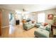 Spacious living area with comfortable seating, light floors, and neutral wall colors at 920 Timor Ave, Orlando, FL 32804