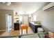 View of the kitchen and living room showcasing appliances and seating at 920 Timor Ave, Orlando, FL 32804