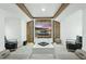 Media room featuring custom millwork, a large screen television, and comfortable seating at 9259 Tibet Pointe Cir, Windermere, FL 34786