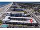 Aerial view of Ocean Jewels Club complex, highlighting proximity to the beach and local amenities at 935 S Atlantic Ave # 244, Daytona Beach, FL 32118