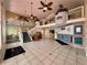 Grand lobby entrance with tiled floors, ocean mural, and a staircase to the second level at 935 S Atlantic Ave # 244, Daytona Beach, FL 32118