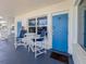 Inviting condo patio with seating, perfect for relaxing and enjoying the outdoor view at 935 S Atlantic Ave # 244, Daytona Beach, FL 32118
