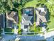 Aerial view of the property showing the house, pool, and surrounding neighborhood at 9455 Belmont Ter, Oviedo, FL 32765