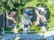 Aerial view of the property showing the house, pool, and surrounding neighborhood at 9455 Belmont Ter, Oviedo, FL 32765