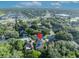 Aerial view showcases the property's location in a residential area with nearby amenities and roadways at 9455 Belmont Ter, Oviedo, FL 32765