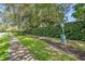 Well-maintained walking trail with lush greenery, providing a scenic and pet-friendly environment at 9455 Belmont Ter, Oviedo, FL 32765