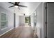 Inviting living room with wood floors and gray walls at 1002 S Locust Ave, Sanford, FL 32771