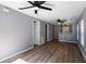 Spacious living room with new floors and easy access to the kitchen at 1002 S Locust Ave, Sanford, FL 32771