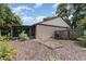 Fenced backyard featuring a screened in porch and garden at 106 Water Oak Dr, Sanford, FL 32773