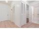 Bright foyer with tile flooring, closet, and an open view to a bathroom beyond at 106 Water Oak Dr, Sanford, FL 32773