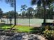 Community tennis courts are fenced and well-maintained at 106 Water Oak Dr, Sanford, FL 32773