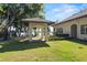Beautifully landscaped backyard with lakeside gazebo offering serene views, perfect for outdoor enjoyment at 1112 Preserve Point Dr, Winter Park, FL 32789