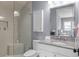 Bathroom features a glass-enclosed shower, granite counters, and a vanity at 1112 Preserve Point Dr, Winter Park, FL 32789