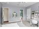 Light-filled bedroom features a study area, white trim, and neutral decor at 1112 Preserve Point Dr, Winter Park, FL 32789