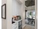 Convenient Butler's pantry with white cabinetry and stainless steel refrigerator drawers at 1112 Preserve Point Dr, Winter Park, FL 32789