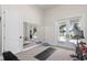Home gym with mirrors and sliding glass doors to outdoor area at 1112 Preserve Point Dr, Winter Park, FL 32789