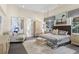 Bright main bedroom with neutral tones, decorative accents, and outside view at 1112 Preserve Point Dr, Winter Park, FL 32789