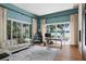 Comfortable office space with large windows offering scenic lake views at 1112 Preserve Point Dr, Winter Park, FL 32789