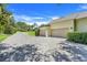 Wide brick driveway leads to the attached garage with plenty of parking space at 11602 Graces Way, Clermont, FL 34711