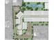 Aerial view of a residential layout with a pond, dog park, and strategically placed retention ponds at 130 River Front Way, Edgewater, FL 32141