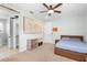 Bright bedroom with a large wall map, and a conveniently located ensuite bathroom at 1365 Tappie Toorie Cir, Lake Mary, FL 32746